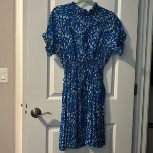 Blue and white flower print. Size L. Smocked waist and collar.